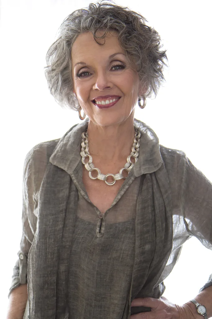 Older woman's fashion headshot.